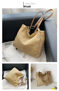 Detail view of khaki straw tote bag featuring fine weave texture and leather straps