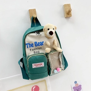 Zaino per bambini verde e crema con orsetto di peluche 3D e tasca trasparente