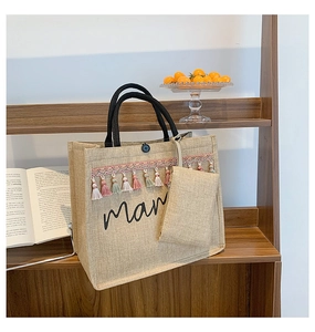 Linen tote bag with mama embroidery, colorful fringe details and matching small pouch