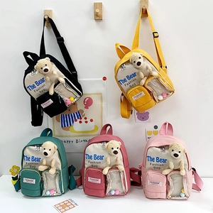 Zaino per bambini con orsetto di peluche e tasca trasparente in cinque colori vivaci