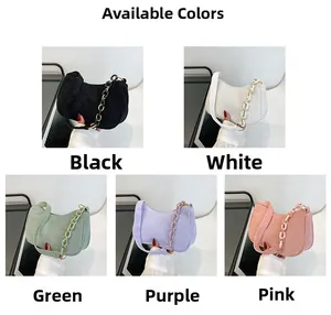 Close-up of corduroy shoulder bags showing five colors with chain strap details