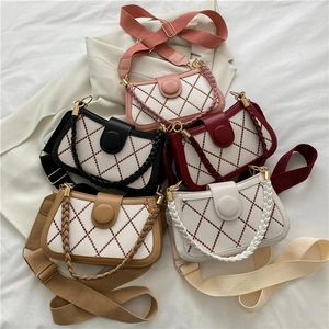 Diamond quilted crossbody bag with woven handle and wide strap in five stylish colors
