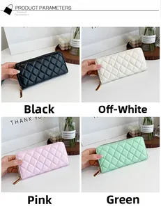 Dettaglio dei portafogli lunghi trapuntati nei colori nero, bianco, rosa e verde