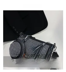 Detail of rhinestone crossbody bag with a round mini coin purse and wide fabric strap