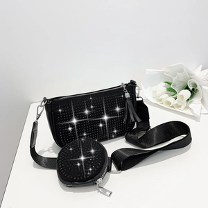 Detail of black rhinestone three-in-one underarm bag with small round coin purse and nylon strap