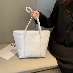 Minimalist white quilted PU leather tote bag with geometric stitching for women's office commute