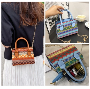 Detailed view of bohemian woven mini crossbody bag with leather handle and chain strap