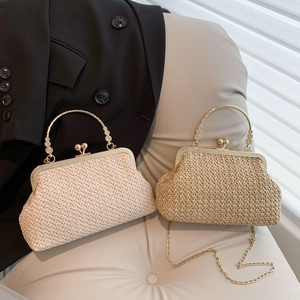 Retro straw shell crossbody bag with ornate gold handle and metal chain shoulder strap