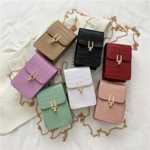 Selection of mini faux crocodile leather chain bags in seven vibrant assorted colors