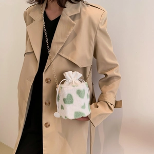 Plush heart pattern bucket bag with golden chain strap for women, stylish green on white