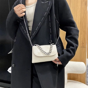 Beige crocodile embossed envelope bag with bold silver metal chain strap for women