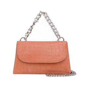 Orange croc-effect envelope bag with bold silver chain handle and crossbody strap
