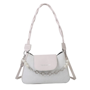 Elegant cream textured shoulder bag with pearl flower chain and braided strap details