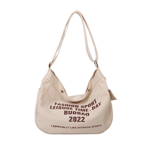Minimalist beige canvas crescent bag with fashion letter print and adjustable shoulder strap