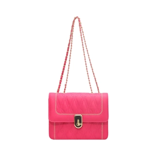 Chic magenta quilted crossbody bag with chain strap and gold twist lock closure