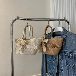 Large capacity woven straw handbags with lace bows in beige and light khaki tones
