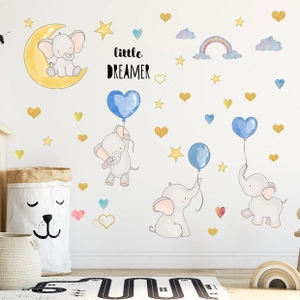 Detail of baby elephant wall stickers with stars and Little Dreamer quote for nursery