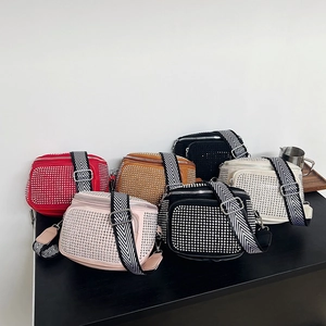 Chic multi-color rhinestone crossbody bags with woven straps and stud detailing