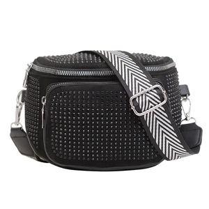 Black rhinestone bucket crossbody bag with chevron strap and silver hardware detail