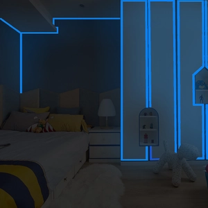 Luminous blue glow tape for stairs and wall edges in a modern bedroom interior