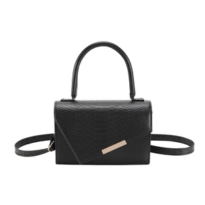 Black crocodile embossed top handle square bag with asymmetrical flap and gold metal trim