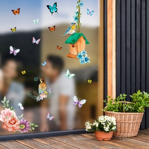 Close-up of double-sided watercolor flower and butterfly static window clings