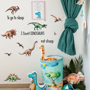 Détail de stickers muraux dinosaures colorés avec texte pour décoration de chambre d'enfant