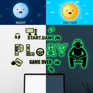 Luminous game controller wall stickers showing green glow effect in day and night contrast