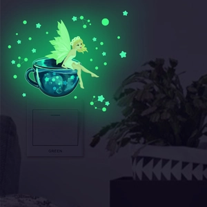 Luminous fairy and stars wall sticker for bedroom decor showing bright green glow effect