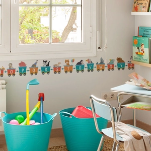 Detailed close-up of cartoon animal alphabet train wall stickers O to Z in a kids nursery