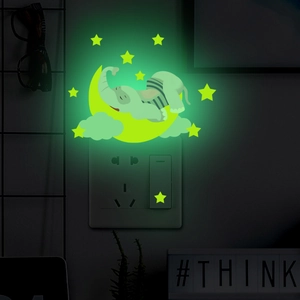 Luminous cartoon elephant on moon wall decal glowing in the dark with stars