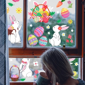 Easter static window clings set featuring cartoon bunnies and colorful eggs on glass