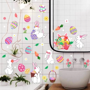 Detailed view of Easter bunny and colorful egg static window stickers on white tiles