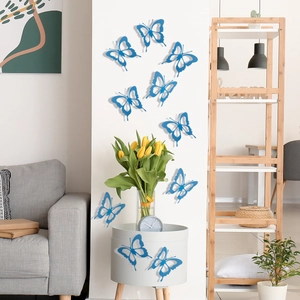 Macro detail of blue hollow 3D butterfly wall stickers for modern living room decoration