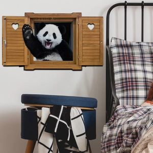 3D wall sticker detail of a giant panda waving through a heart-shaped wooden window frame
