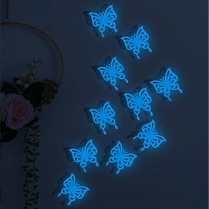 Detailed view of luminous blue 3D hollow butterfly wall stickers glowing in the dark