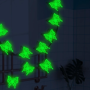 Luminous 3D hollow butterfly wall stickers glowing in the dark on bathroom tiles