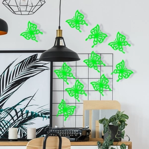 Detailed view of hollow green luminous butterfly wall stickers in a modern home interior
