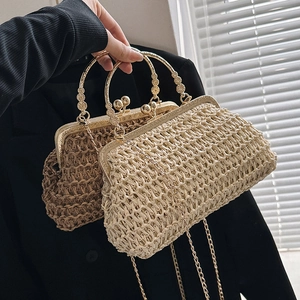 Woven shell handbag with gold ring handle and chain strap in cream and light brown
