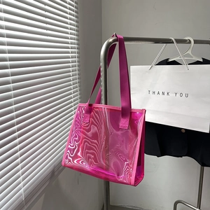 Magenta transparent PVC tote bag with water ripple texture and fabric handles