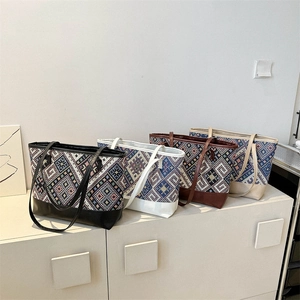 Geometric woven tote bag with leather handles in four colors for stylish daily commuting