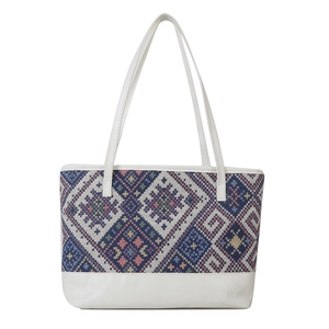 Ethnic bohemian tote bag with colorful geometric patterns and white leather accents