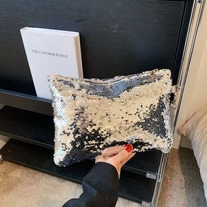 Elegant silver sequin evening clutch bag with sparkling rhinestone tassel and zipper