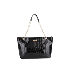 Fashionable black crocodile embossed tote bag with gold chain and polished finish