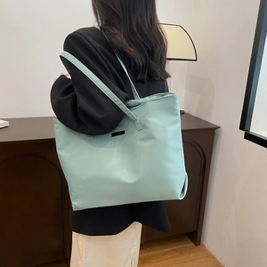 Minimalist mint green large capacity canvas tote bag for daily commute and college life