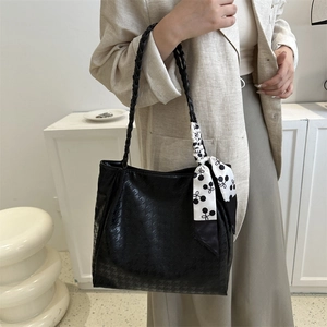 Fashion black woven tote bag with houndstooth texture and floral silk scarf for women