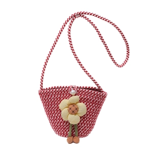 Kids woven bucket bag in red and white stripes with a large yellow flower ornament