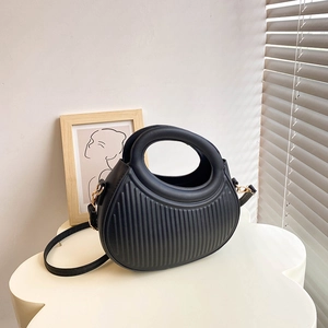 Chic black semi-circular PU crossbody bag with vertical textures and gold hardware accents