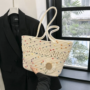 Off-white woven cotton tote bag with colorful polka dots and 3D white daisy flower charm