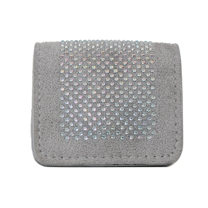 Mini gray suede crossbody bag with iridescent rhinestones and fine chain strap